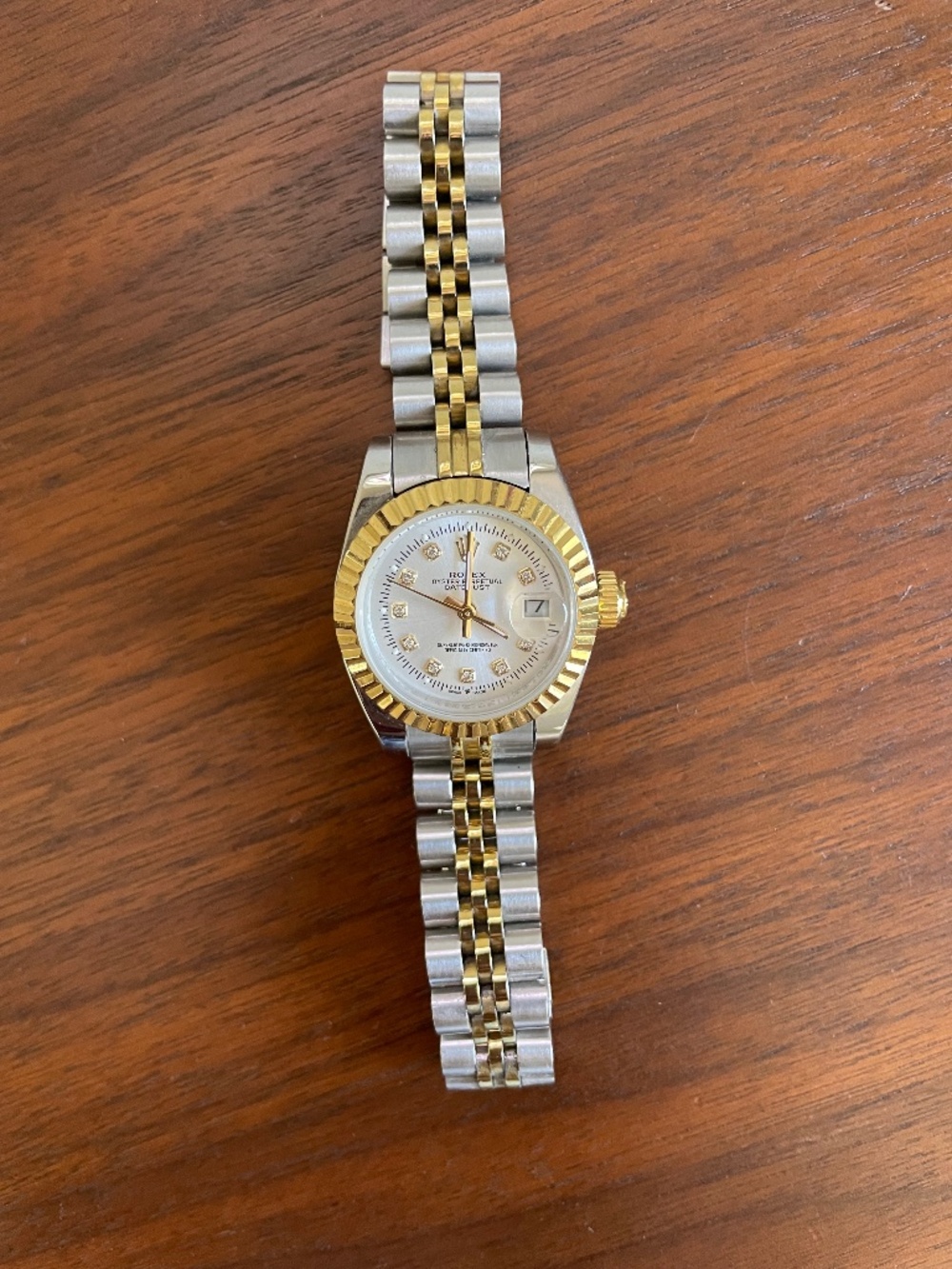 Gold and silver women’s watch